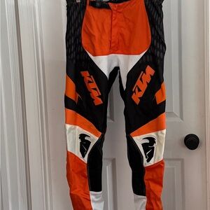 KTM Powerwear by Thor.          Orange and Black Off Road Pants